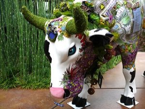 Ms. Moovement Art Cow with landscape design theme